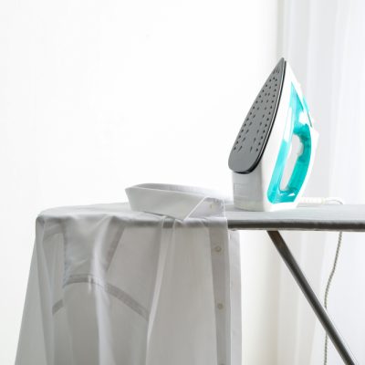 Iron,And,Shirt,On,Ironing,Board,,Space,For,Text